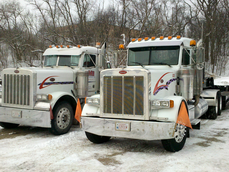 Two trucks in winter