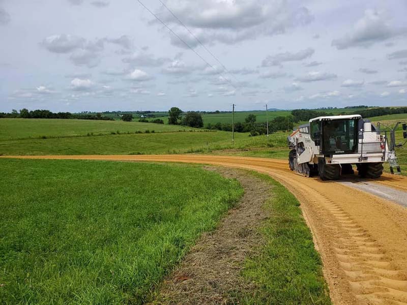 Final strip of pavement being removed